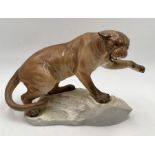 A large Beswick Puma on a rock numbered 1702