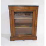 A French inlaid display cabinet with ormolu mounts - one piece of trim missing.