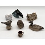 A collection of ceramic animals including three Poole Pottery stoneware pieces, studio pottery sheep