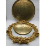 A gilt framed mirror plus a large decorative brass plate