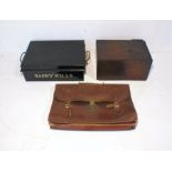 A 'Holmes & Son' tin lockbox, along with a leather satchel and a wooden box, A/F.