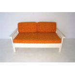 A mid-century painted day bed, length 135cm (extends to 200cm), depth 69cm, height 64cm.