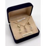 An Austrian crystal set of earrings and pendant on fine chain, all set in 9ct gold