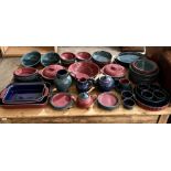 A large collection of Denby Harlequin including dinner plates, jugs, bowls, oven dishes, meat