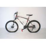 A Giant "Talon 3" adult mountain bike with Shimano hyperdrive gearing, disc brakes, Rockshock, air