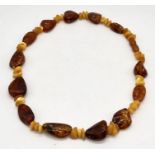 A two tone Baltic amber necklace, weight 46.3g