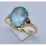 A 10ct gold blue topaz ring