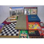 A collection of vintage games including chess, backgammon, Totopoly, Trivial Pursuit, Jenga, Walt