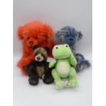 A Charlie Bears "Frederick" Frog from the Baby Boutique Collection, along with three other Charlie