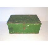 A vintage green painted storage trunk.