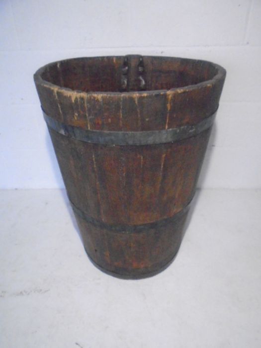 A vintage grape collector metal bound barrel
