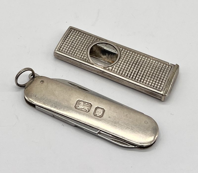 A hallmarked silver cigar cutter along with a silver cased penknife - Image 2 of 2