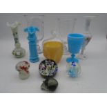 A collection of antique and vintage glassware including celery vases, paperweight etc.