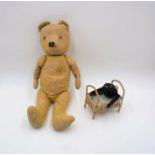 An antique teddy bear, along with a clockwork toy, A/F.