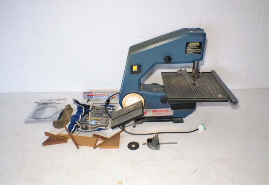 A 'Naerock' bandsaw with accessories.