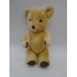 A Dean's Centurian teddy bear with jointed limbs and stitched nose