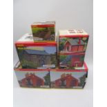 A collection of six boxed Hornby Skaledale OO gauge scale model buildings including Main Station