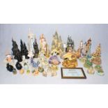A collection of ceramic castles and dragons, including Lilliput Lane, Dream Dragons, Purewhins