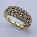 A 9ct gold dress ring set with diamonds, total weight 3.4g