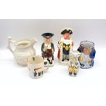 A Beswick Worthingtons charcter jug along with a Guiness mug, other toby jugs etc.