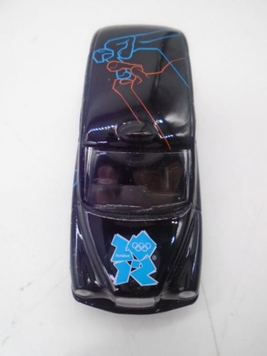 A collection of die-cast cars including 19 Corgi Olympic 2012 boxing London Black Taxi's, Maisto - Image 8 of 8