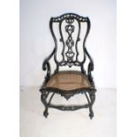 A Portuguese 17th/18th Century chair with caned seat