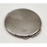 An Art Deco hallmarked silver compact