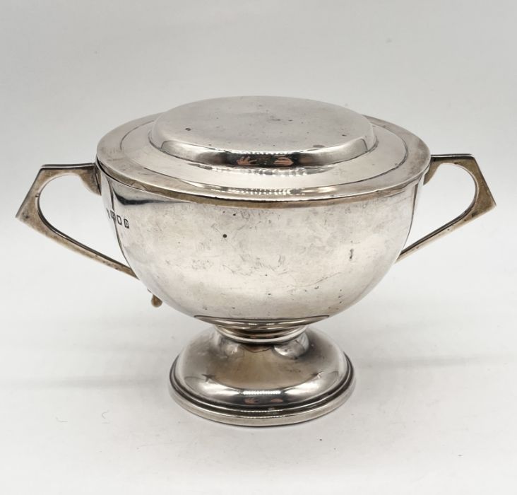 A hallmarked silver two handled cup with saucer/lid inscribed "Philippa", total weight 212.3g