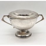 A hallmarked silver two handled cup with saucer/lid inscribed "Philippa", total weight 212.3g