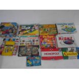 A large collection of vintage board games including Hungry Hippo's, Risk, Monopoly, Battleship,