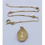 A fine 9ct gold bracelet along with a 9ct gold locket, total weight 2.4g