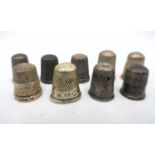 A small collection of nine hallmarked silver thimbles, some A/F.
