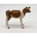 A Beswick Red Friesian Calf in matt model no. 1249C.