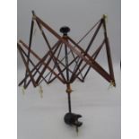 A 19th Century extending wool winder with clamp base (missing pin cushion)
