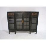 An Oriental break-fronted display cabinet with Shibayama inlay detailing and decorative carving,