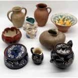 A collection of various studio pottery including Wetheriggs teapot, lidded bowl and jug