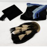 A vintage Ravenscroft Mortar Board hat and graduation hood along with a leather backed Sporran