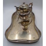 A collection of silver-plated items including a tea pot, gallery tray etc