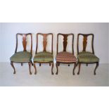 A set of four Victorian mahogany dining chairs, with cabriole legs.
