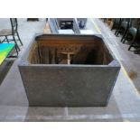 A large metal rivetted galvanised tank, length 107cm, depth 85cm, height 71cm.