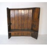 An antique elm tavern settle, length 154cm, depth 30cm, height 164.5cm.