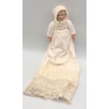 An antique bisque headed doll numbered 3/O "Germany" indistinct mark possibly Gebrüder Heubach