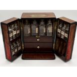 19th century mahogany travelling apothecary cabinet with recessed brass carry handle to top and twin