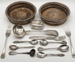 A collection of silver cutlery including a Georg Jensen fork along with a silver serviette ring
