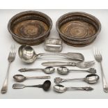 A collection of silver cutlery including a Georg Jensen fork along with a silver serviette ring