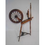 An antique spinning wheel.