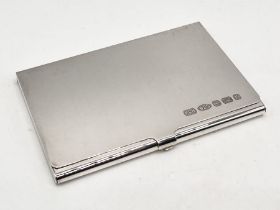 A hallmarked silver card case