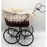 A Victorian style dolls pram