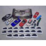 A collection of die-cast cars including 19 Corgi Olympic 2012 boxing London Black Taxi's, Maisto