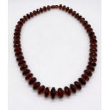 A Baltic amber necklace consisting of graduated faceted beads, weight 53.1g